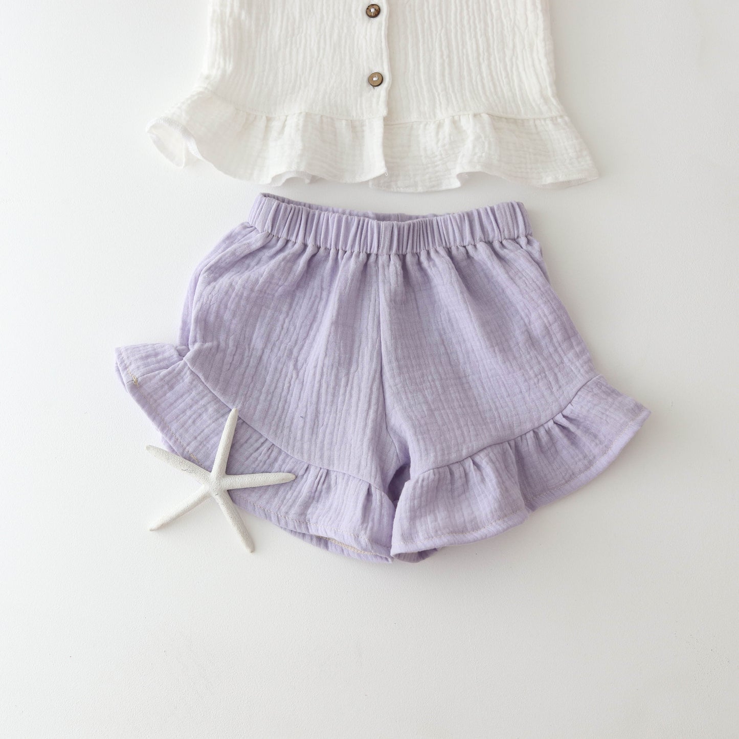 Muslin shorts with a ruffle - PASTEL LILAC